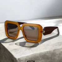 نظارات بولغاري الشمسية BV40006 01A/BLACK X BLACK - بني شفاف
