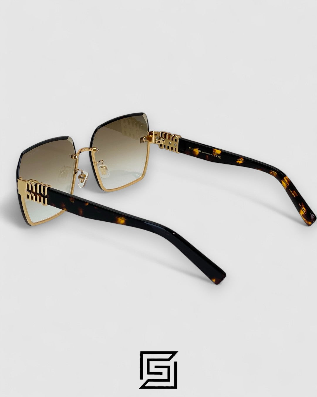 Miu Miu MU60ZS Light Brown Lenses and Gold Frame