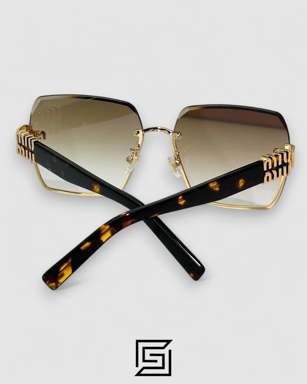 Miu Miu MU60ZS Light Brown Lenses and Gold Frame