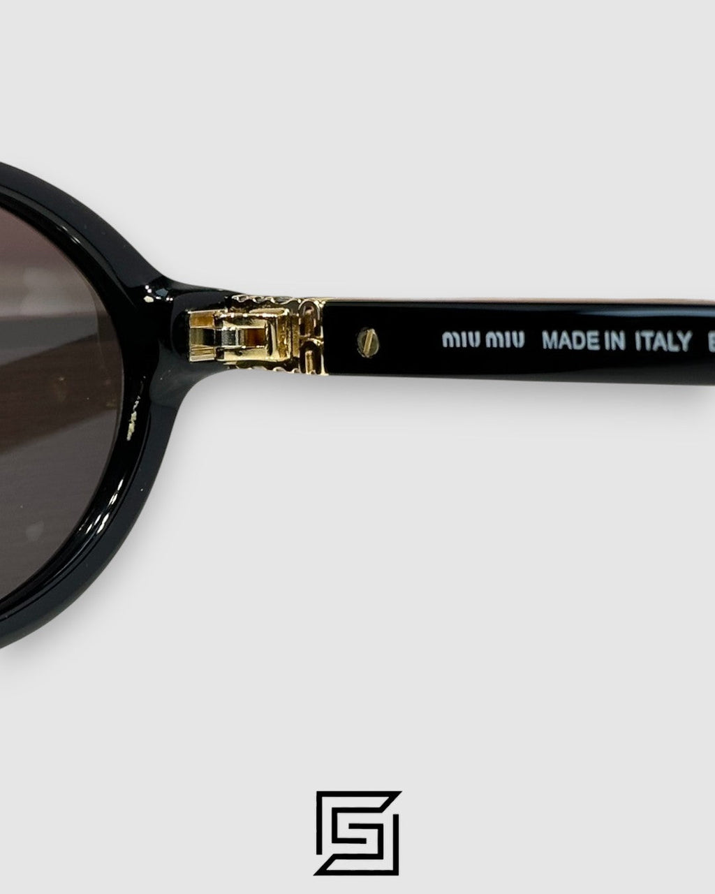 Miu Miu SMU04Z Brown Lenses with Tiger Brown Frame Gold Logo Sunglasses