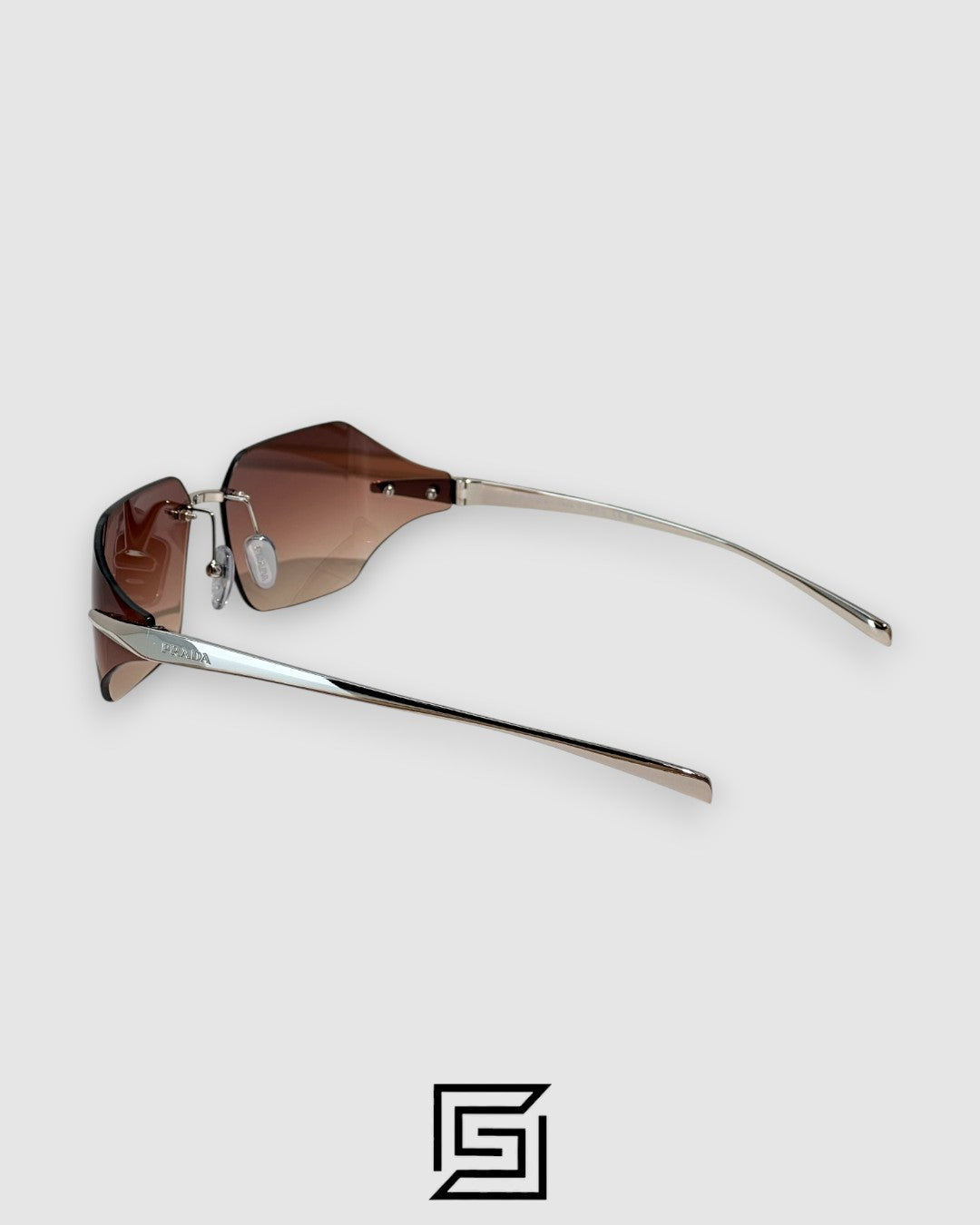 Prada SPR A55 Brown Lenses Silver Frame Geometric Rimless